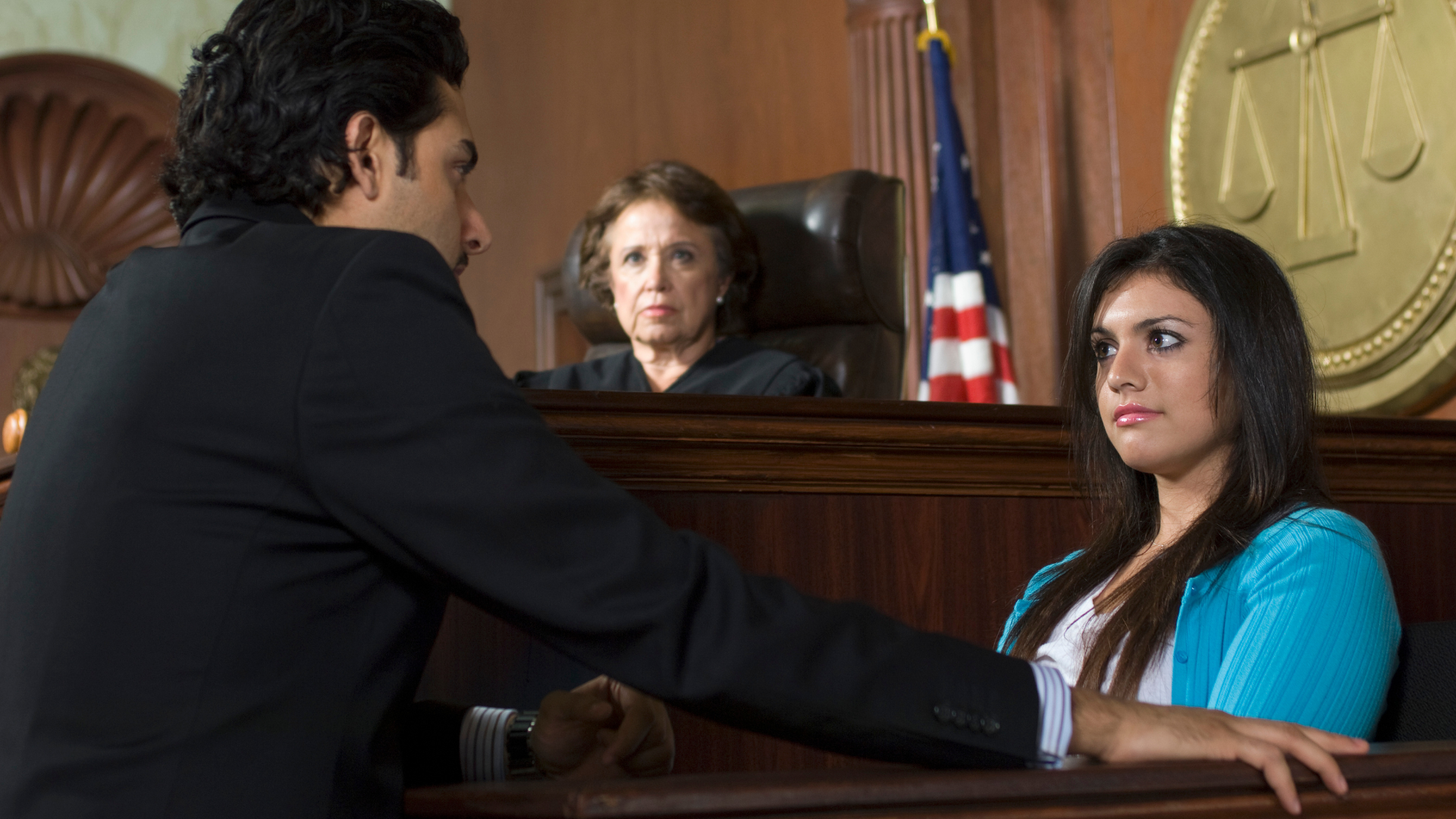 lawyer protecting client in court