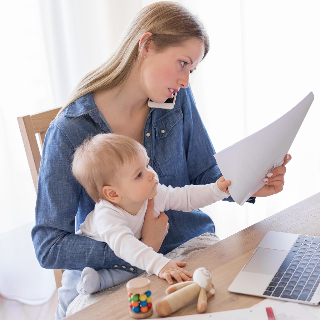 Mother talking on phone trying to get child support changed.