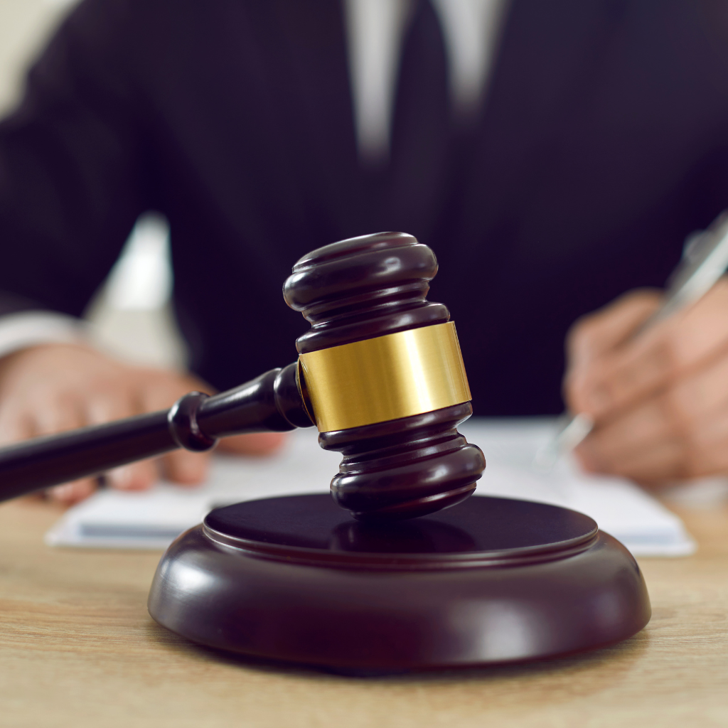 Massachusetts Clerk-Magistrate signing document