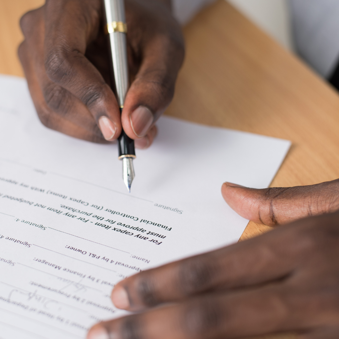 Man filling out Massachusetts divorce papers
