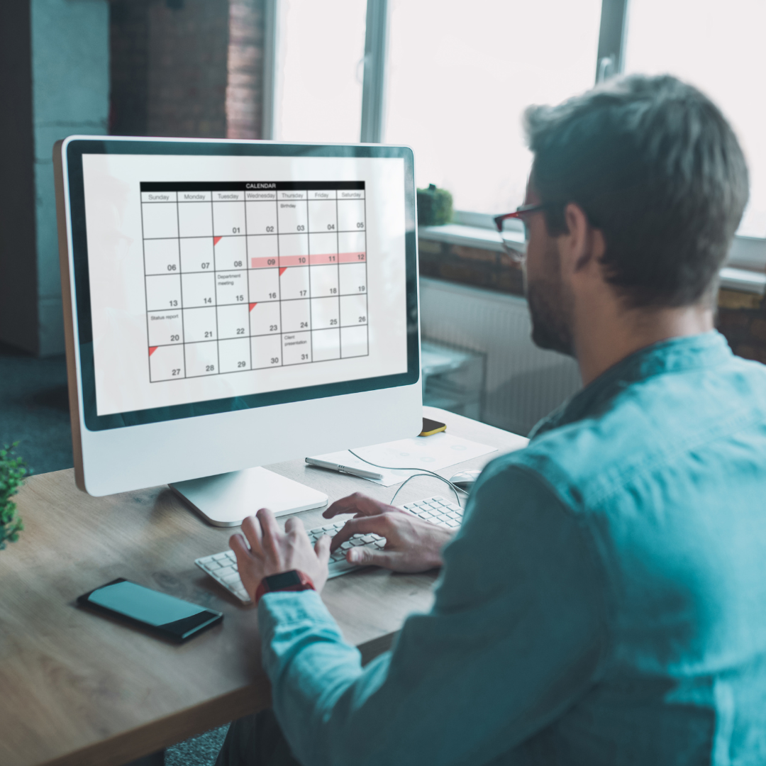 Man looking at calendar seeing how long his Massachusetts divorce will take.
