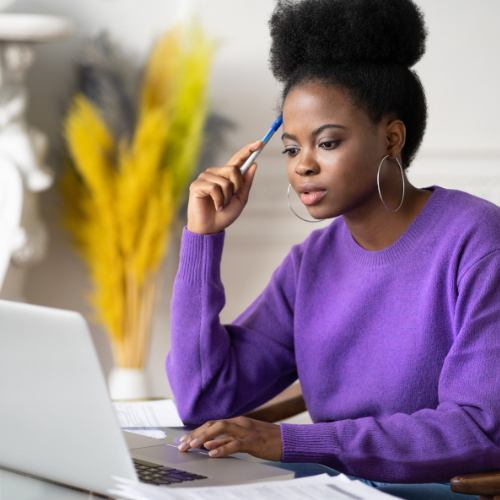 Woman looking up Massachusetts Restraining Orders online.