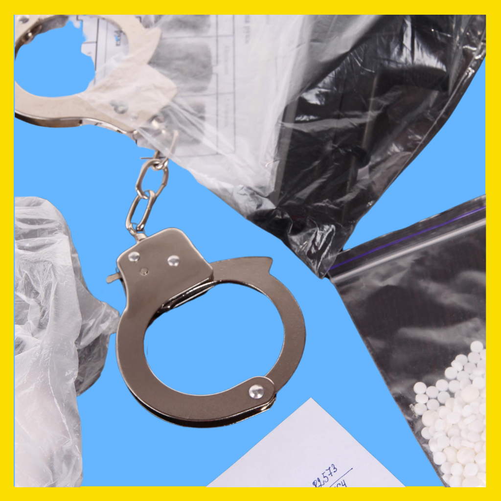 Illegal drugs and handcuffs.