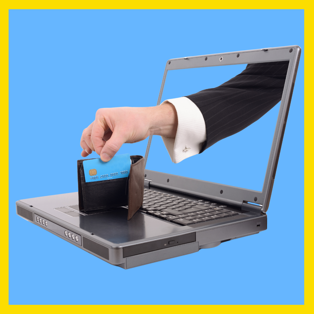 Hand reaching out from computer screen stealing credit card from wallet.