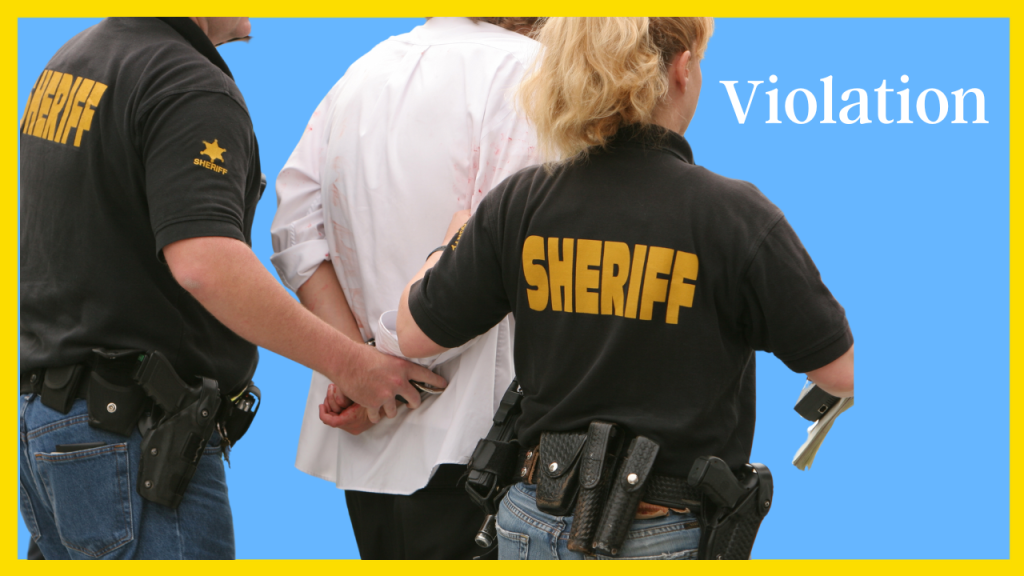 Massachusetts probation violator being taken away in handcuffs.