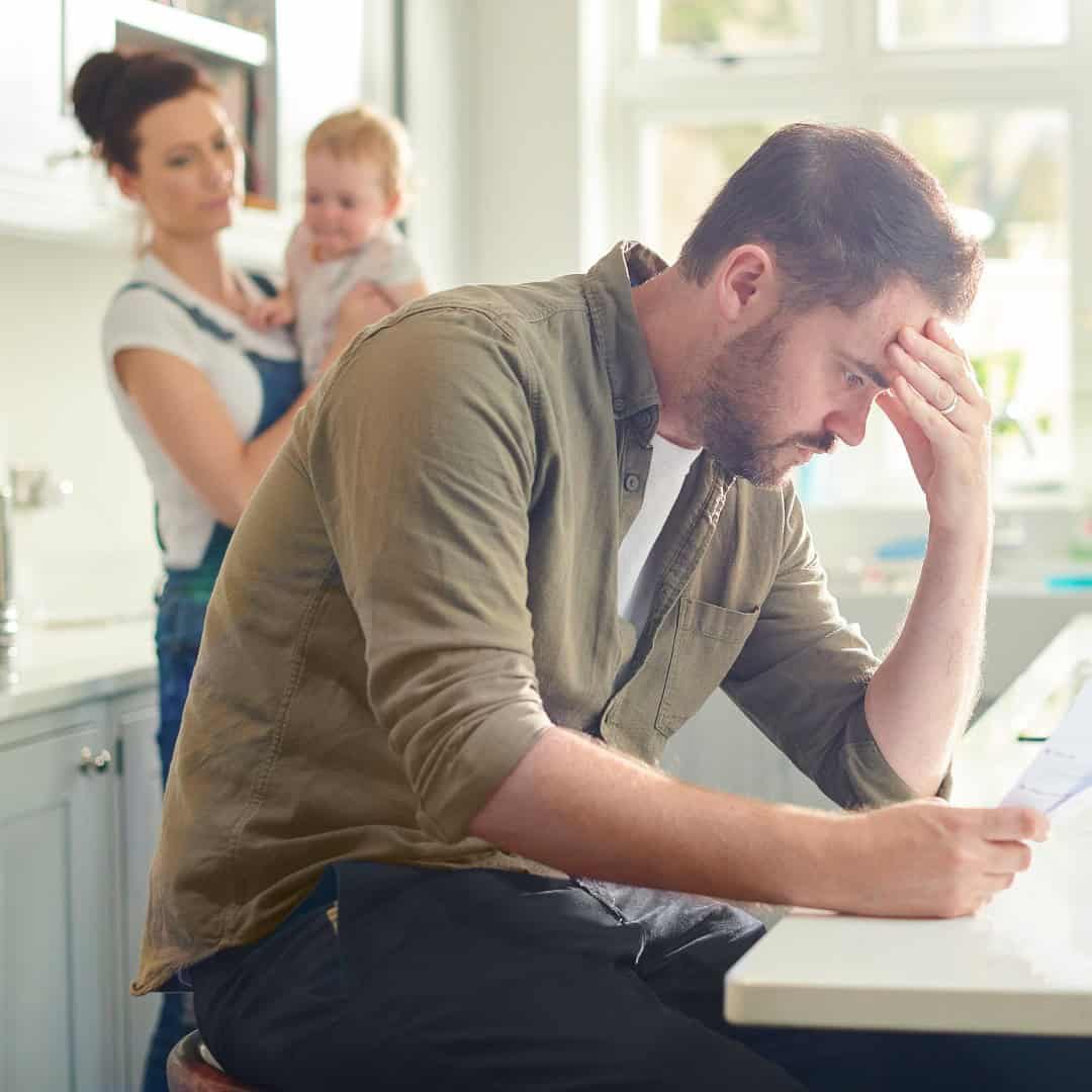Man looking at wife's debt in a Massachusetts divorce