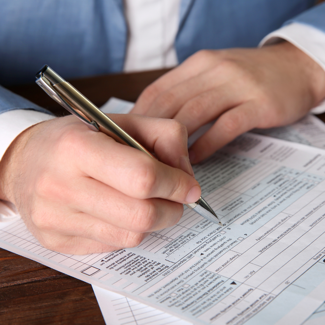 Husband filing divorce paperwork in Massachusetts