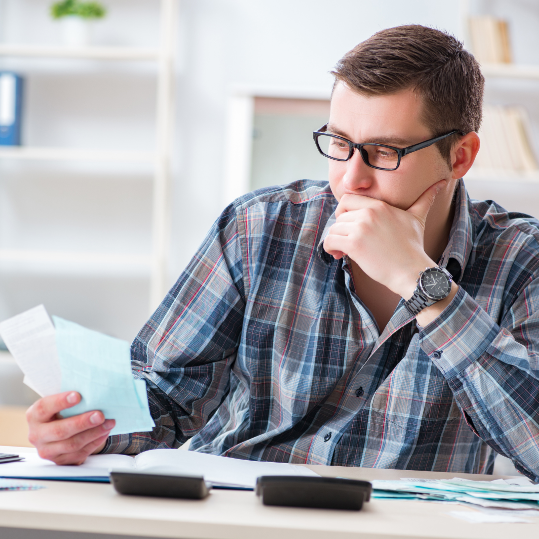 Man with bills to pay after divorce.