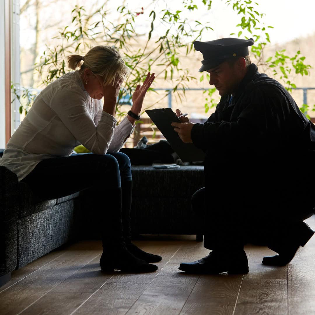 Woman talking to Massachusetts cop about a protective order.